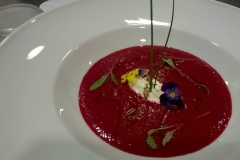 Beetroot soup with crème fraîche and toasted seeds
